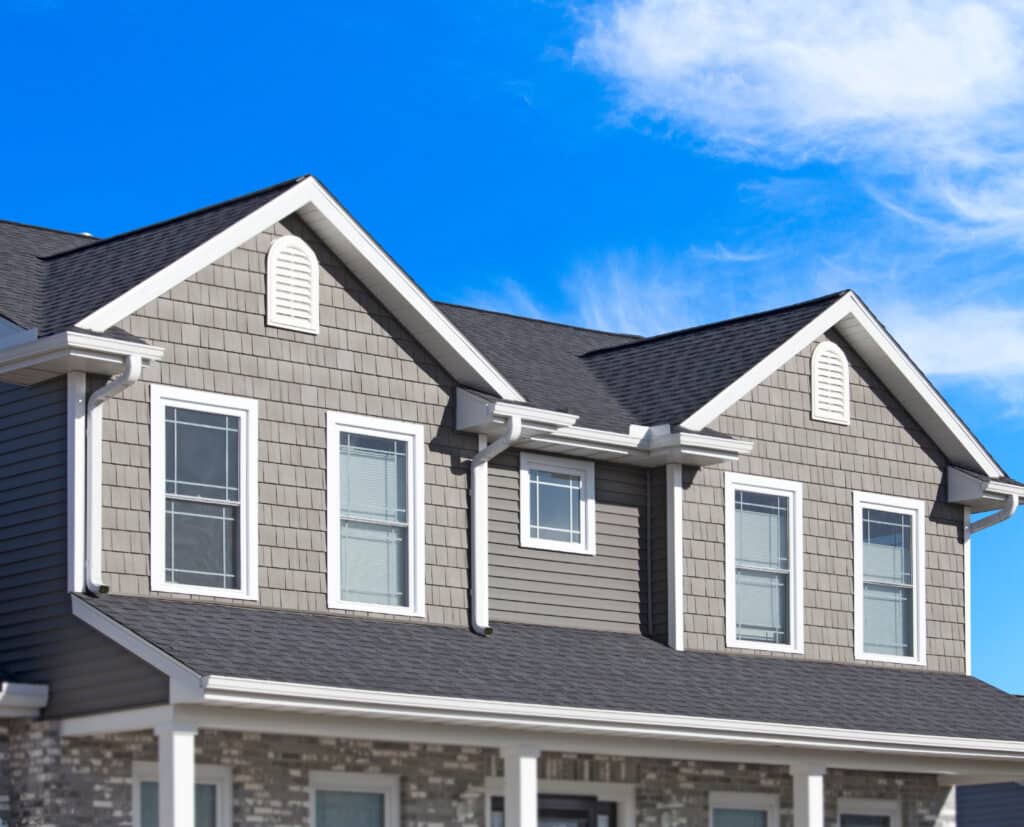 shingle engineered wood siding on dormers top house