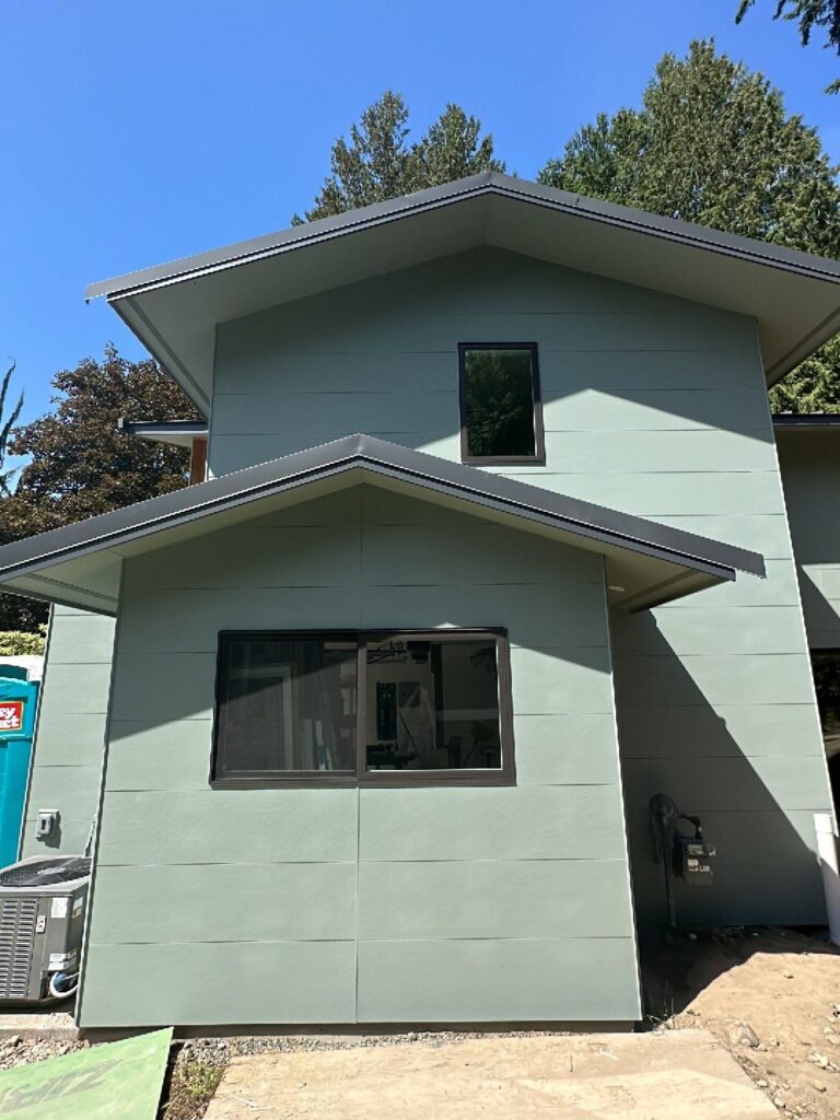 panel siding by james hardie in modern design remodel in redmond, wa