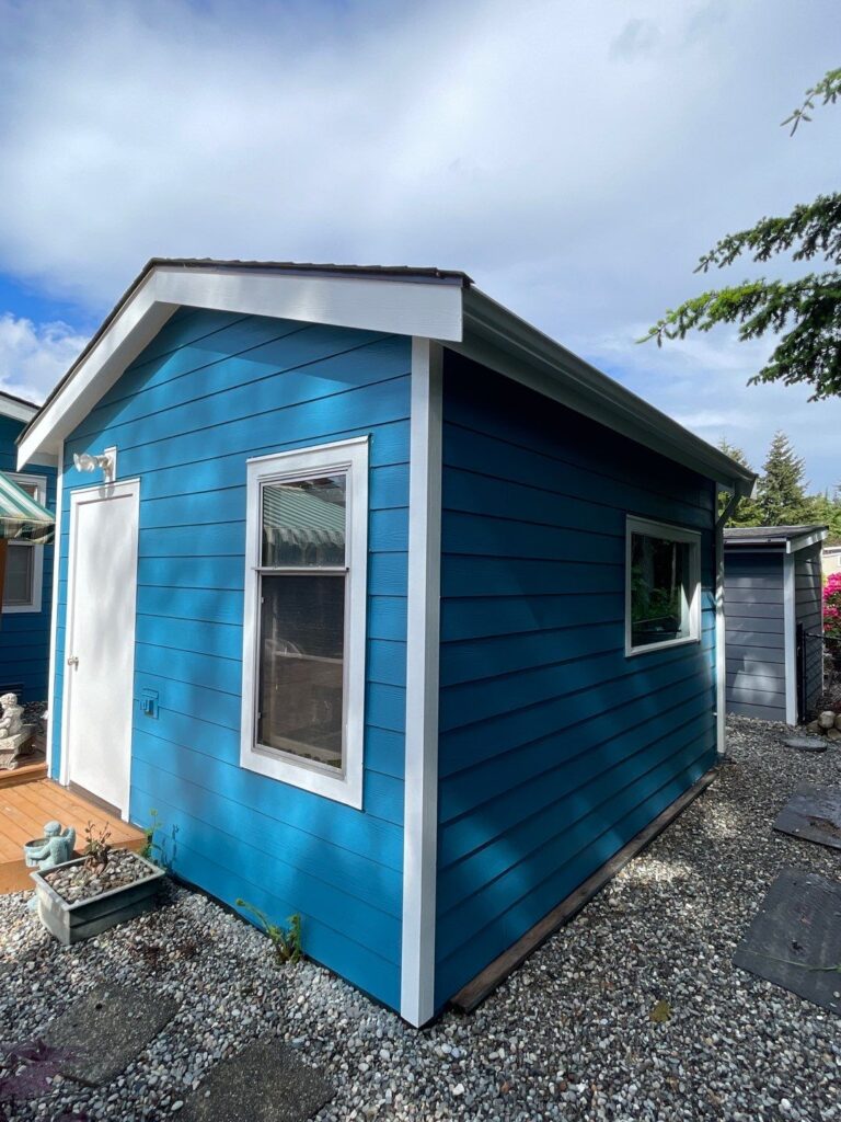 white trim, fascia and blue siding