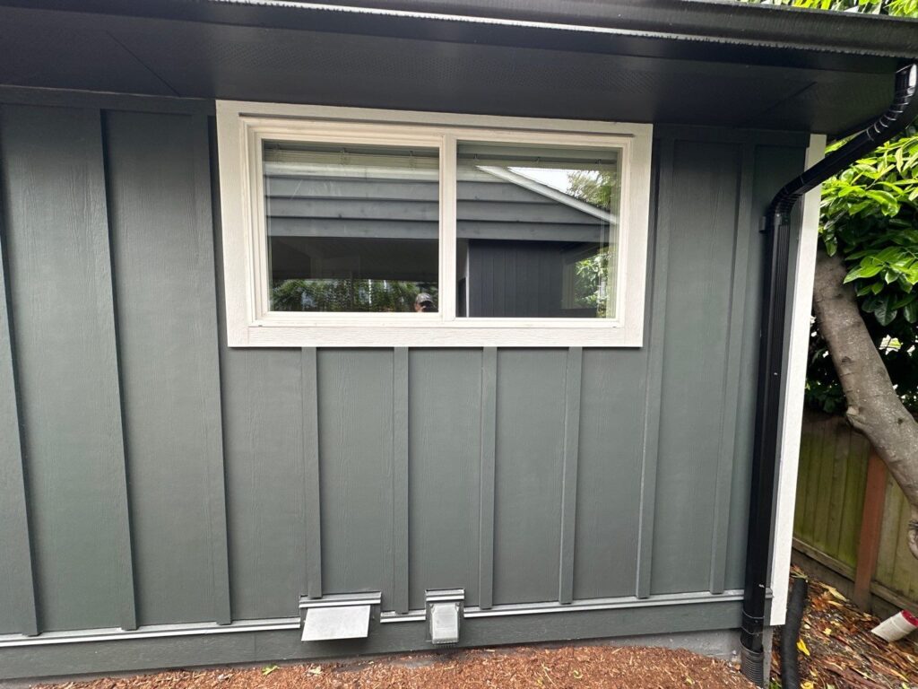 board and batten pre finished james hardie siding installed