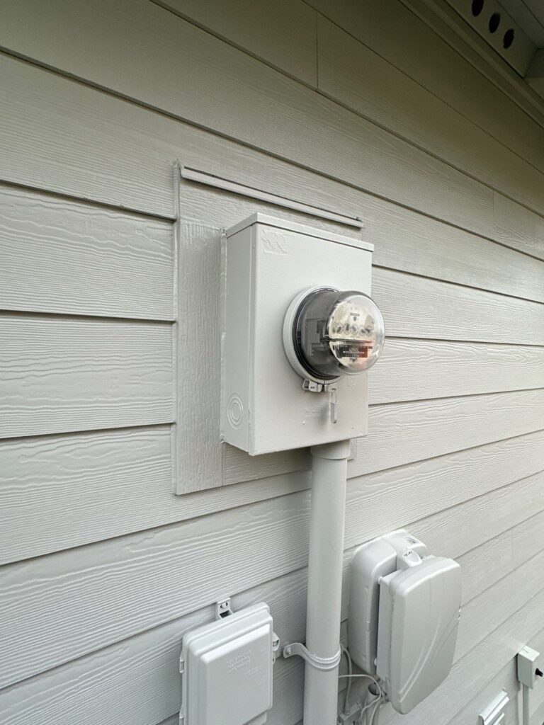 outlet blocks installed with hardie siding in cedarmill texture