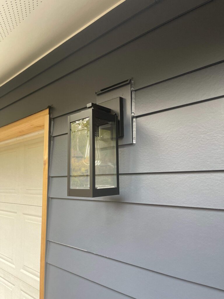 9 1/4 (8” reveal) Smooth primed Hardie Lap siding and 1 board 5 1/4 (4” reveal)