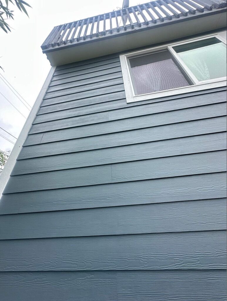 fiber cement siding in evening blue and arctic white corners, trim, fascia