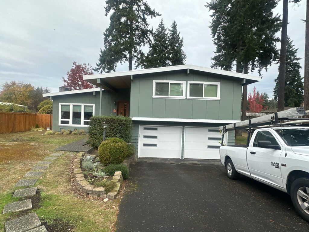 modern design home exterior, 2 story house, white trim details and white garage door