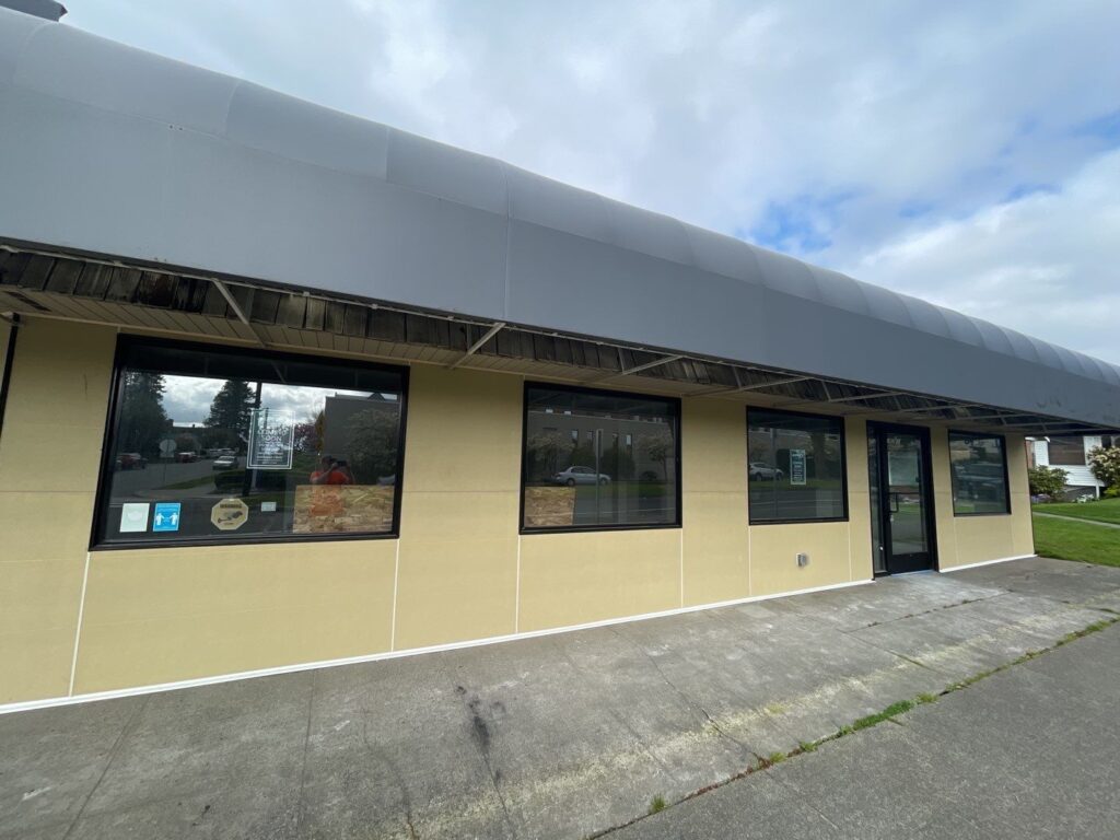 Commercial fiber cement panel replacement on building façade in North Everett, WA