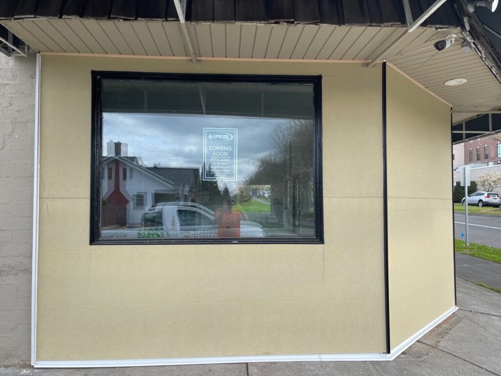 Smooth fiber cement panel installation with black window trim in Everett, WA