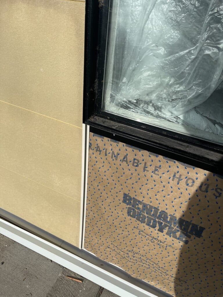 Fiber cement panel replacement with rainscreen and window flashing detail in Everett, WA