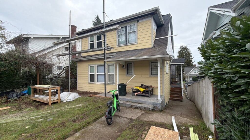Seattle University District home during HardiePlank lap siding installation work in progress