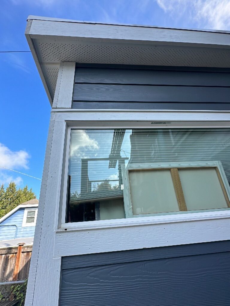 Garage siding upgraded with matching ColorPlus Hardie lap siding