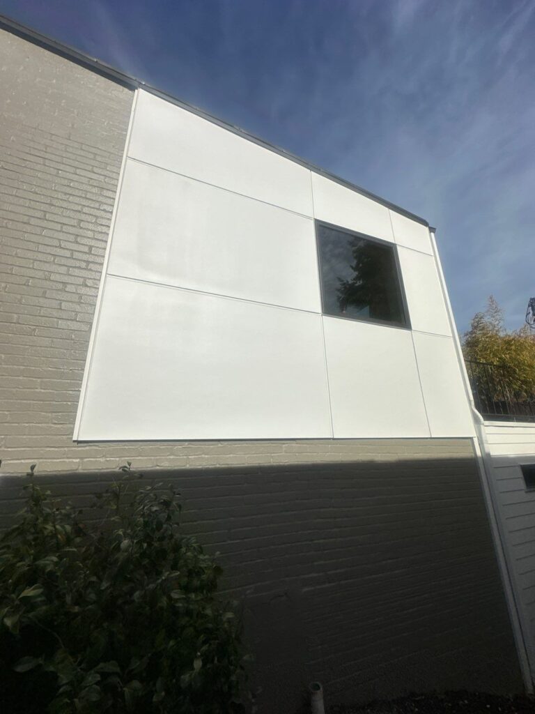 Hardie seam tape on weather barrier for Seattle siding replacement