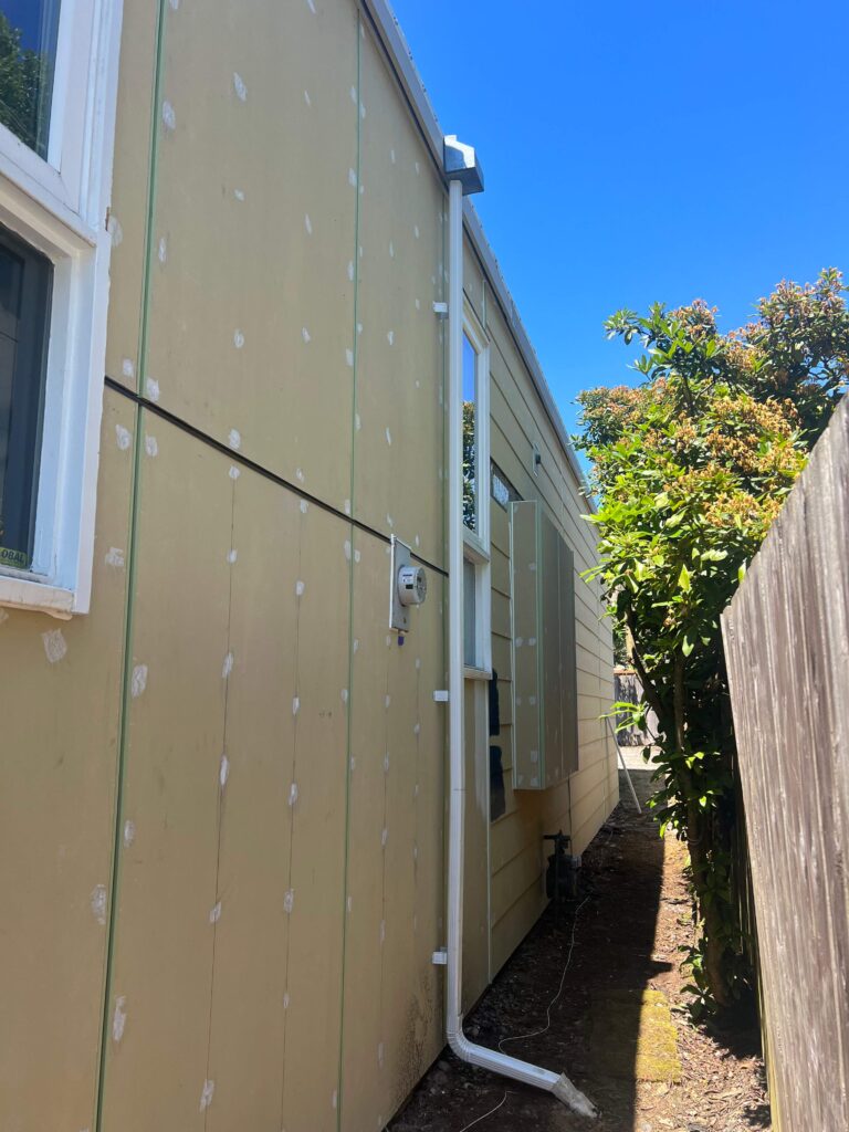 Smooth HardiePanels with Allura battens on Seattle ADU project