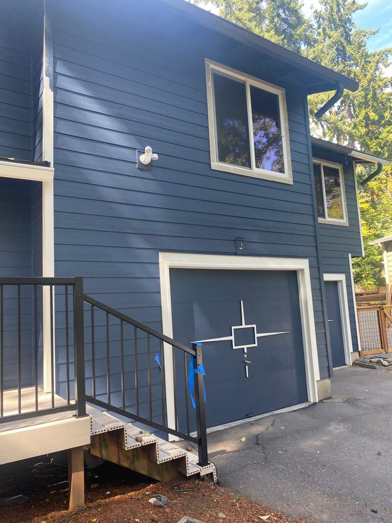 Old siding tear off before HardiePlank installation in Shoreline