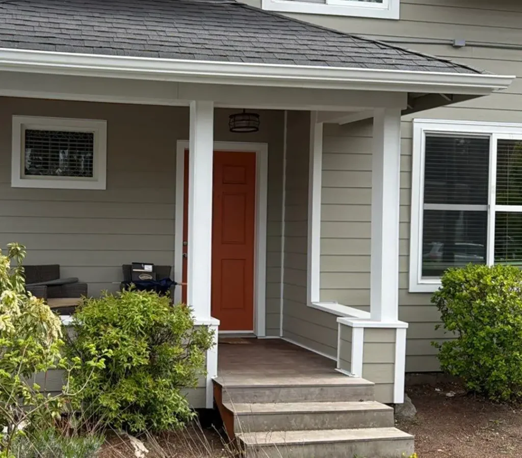 Arctic White rustic Hardie 5/4x4 corners, window trim, and door trim installed with James Hardie siding