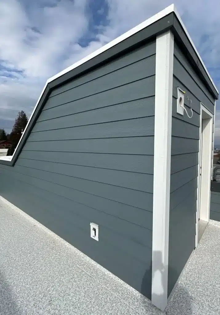 ColorPlus Arctic White Hardie 5/4x4 door trim and pre-painted Hardie blocks installed with James Hardie siding