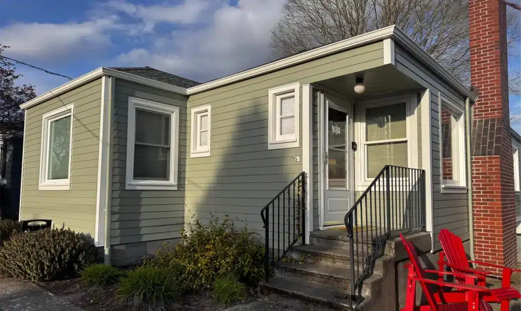 Arctic White rustic Hardie 5/4x4 outside corners, window trim, and door trim installed with James Hardie siding