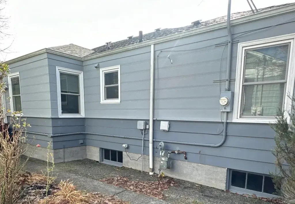 Greenwood, Seattle, WA siding replacement progress with HardieWrap paper with 1 1/2-inch Hardie seam tape