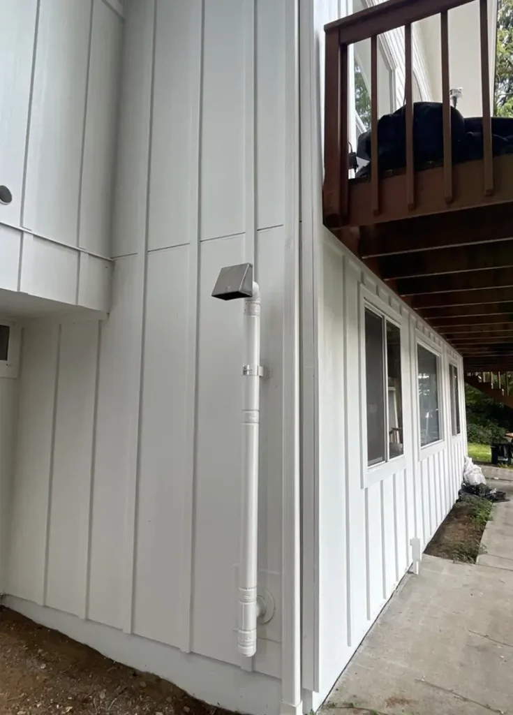 Cedarmill HardiePanel soffit with Tamlyn 5/16 primed H channel between seams on Lake Roesiger / Snohomish, WA siding project