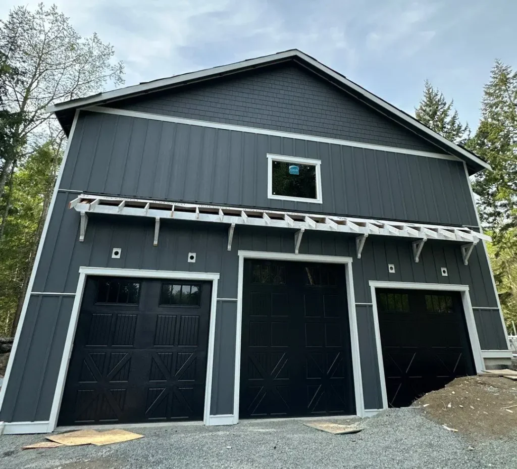 Camano Island Camano Island Night Gray ColorPlus HardiePlank, HardieShingles & Board-and-Batten Exterior by KV Construction