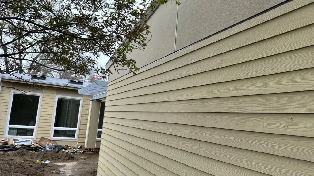Everett project with Pine T&G front entry soffit; QUAD MAX matched to window color