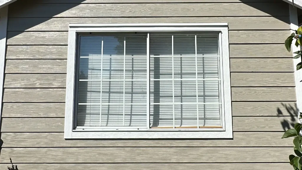 Marysville project with Old siding tear-off and eave painting