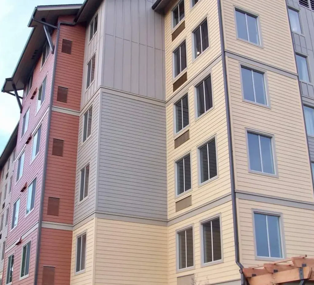 Mukilteo Mukilteo New Construction Hotel Fiber Cement Siding With Board-and-Batten, Panels & Lap Siding by KV Construction