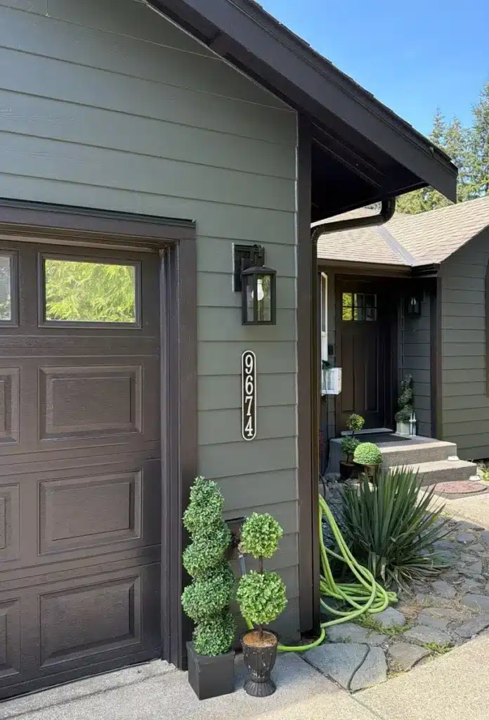 Sedro-Woolley pre-painted James Hardie ColorPlus lap siding, project header color Midnight Black exterior detail