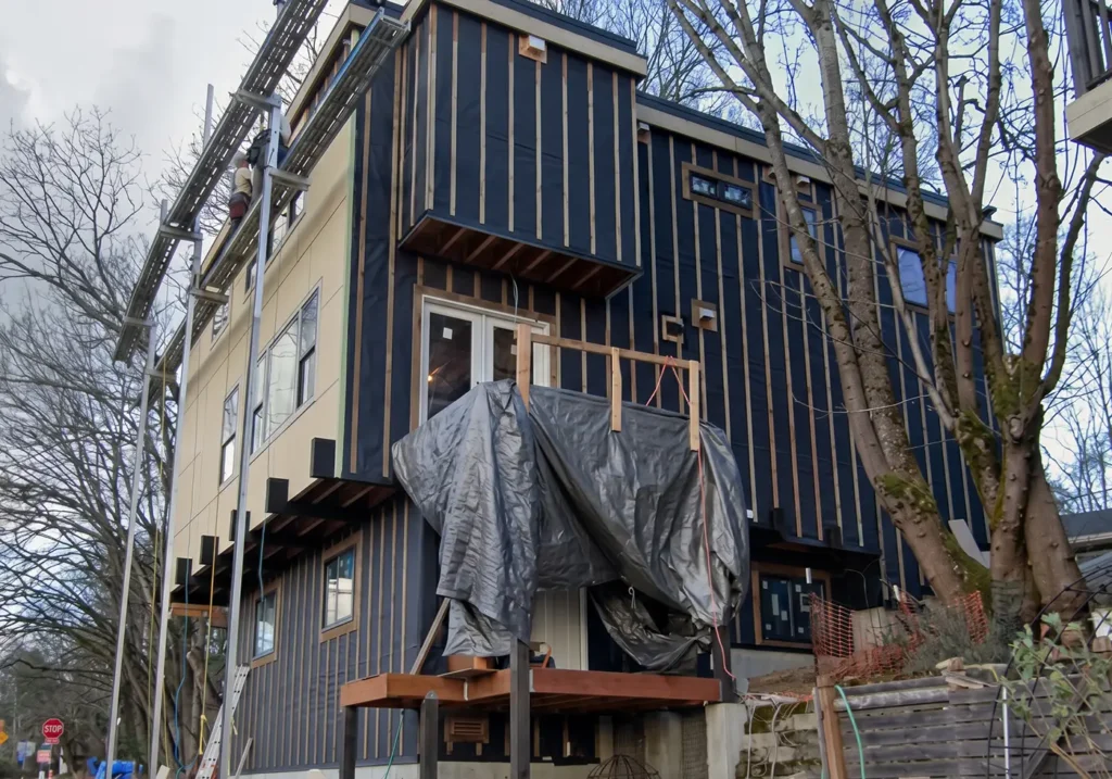 HardieWrap behind James Hardie panel siding