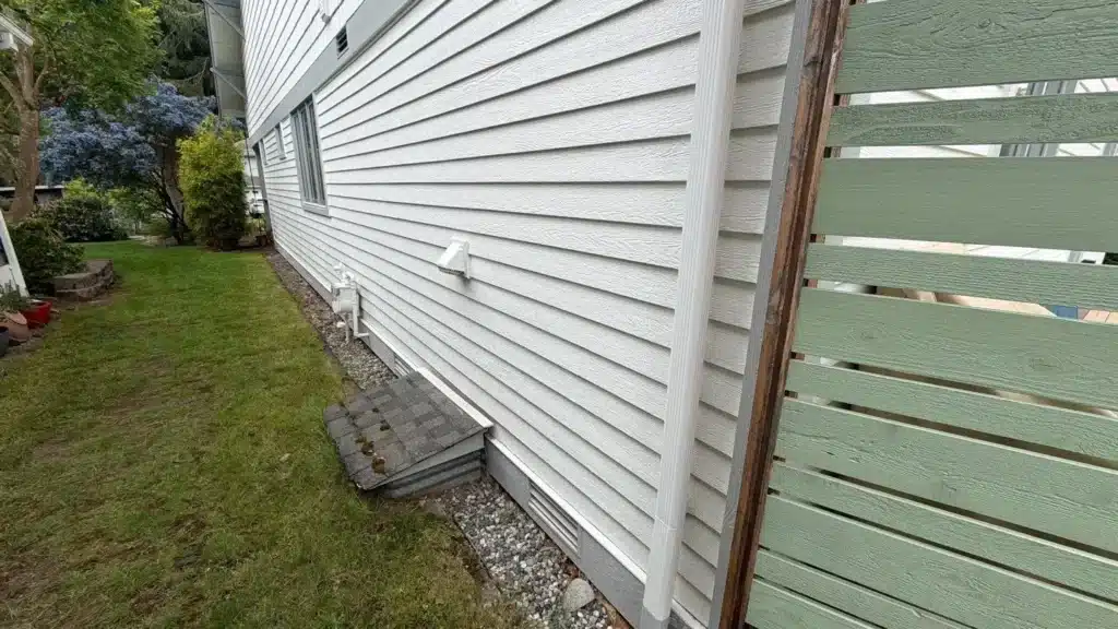 Belly band flashing replacement on Shoreline exterior