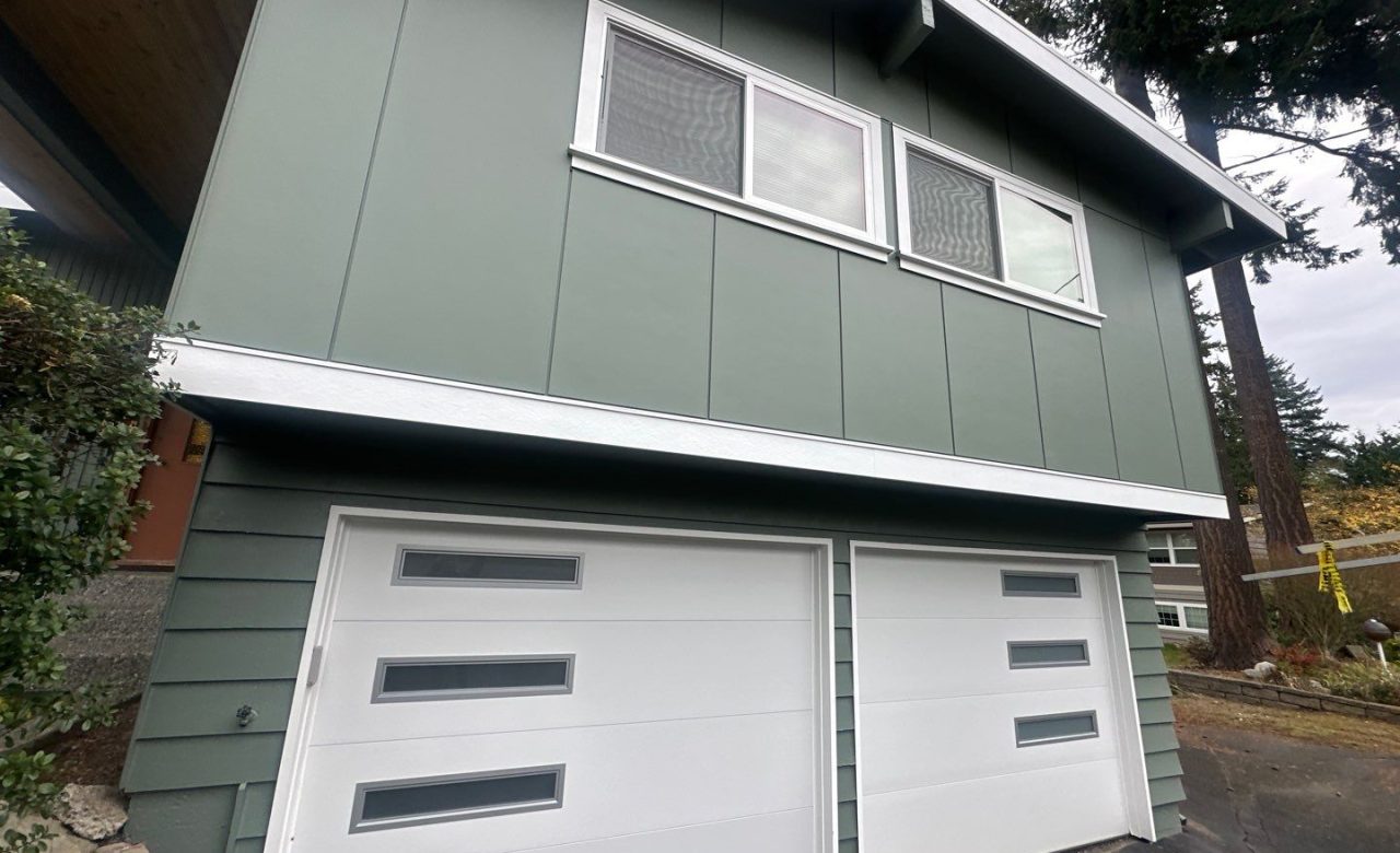 Smooth HardiePanels and ½ inch prime H channels between seams (vertical channel) and prime Z metal between horizontal lines